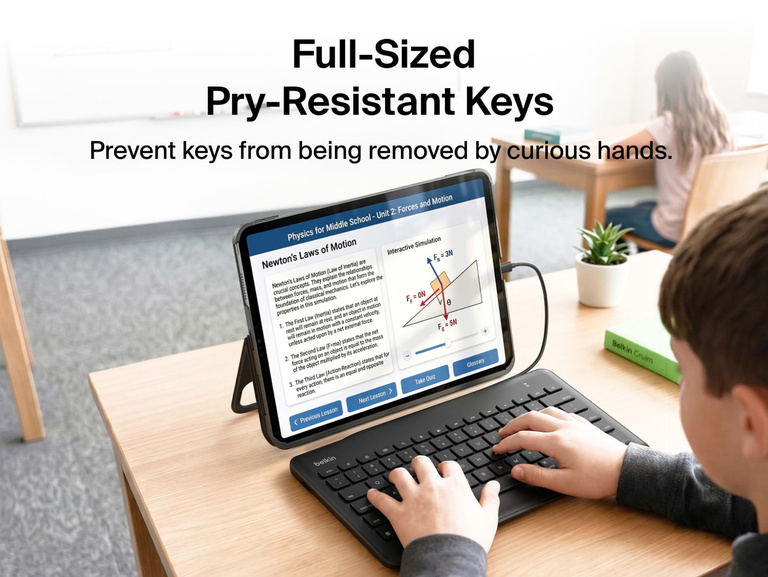 USB-C Keyboard for iPad in use at a classroom desk with a student typing on the keyboard and a full physics lesson visible on the iPad screen