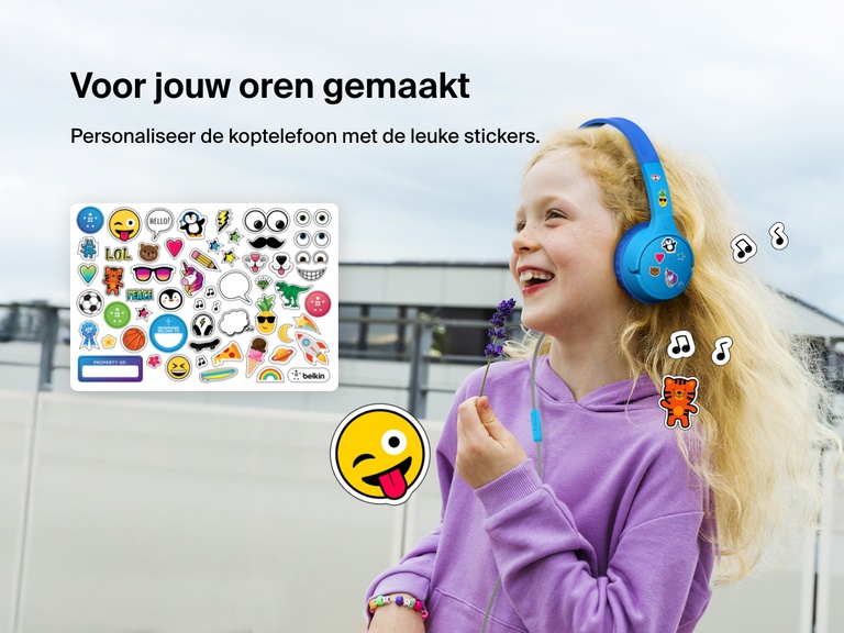Smiling girl wearing Belkin Wired On-Ear Headphones for Kids decorated with colorful stickers, highlighting the headset’s personalization feature with included fun sticker sheet.