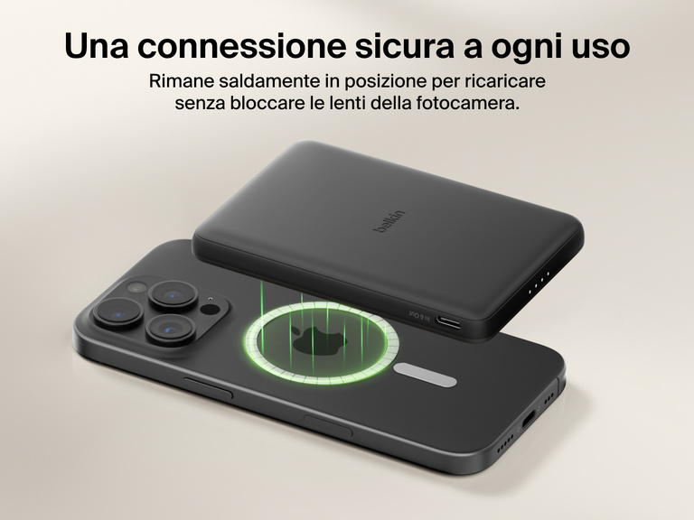 Belkin BoostCharge Slim Magnetic Power Bank 5K shown magnetically aligned between a smartphone and wallet accessory, demonstrating precise magnetic ring for secure attachment and camera-safe design.