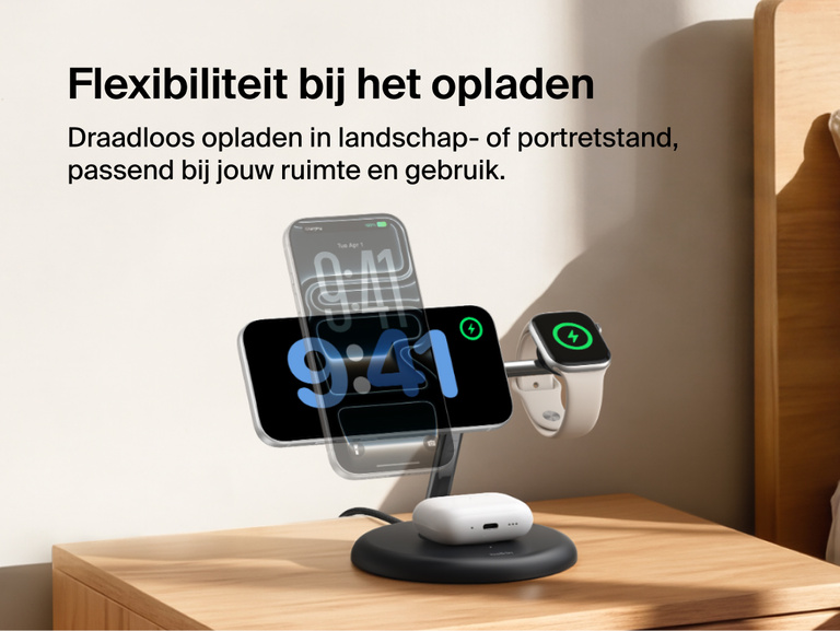 Belkin UltraCharge 3-in-1 Wireless Charging Stand with Qi2 25W charging iPhone in portrait and landscape modes alongside Apple Watch and AirPods on a bedside table