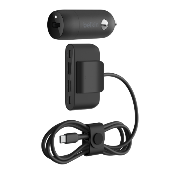 A Belkin car charger set, including a black cylindrical USB car charger, a hub with multiple USB ports and an attached cable, and a USB-C charging cable neatly coiled with a Velcro strap.