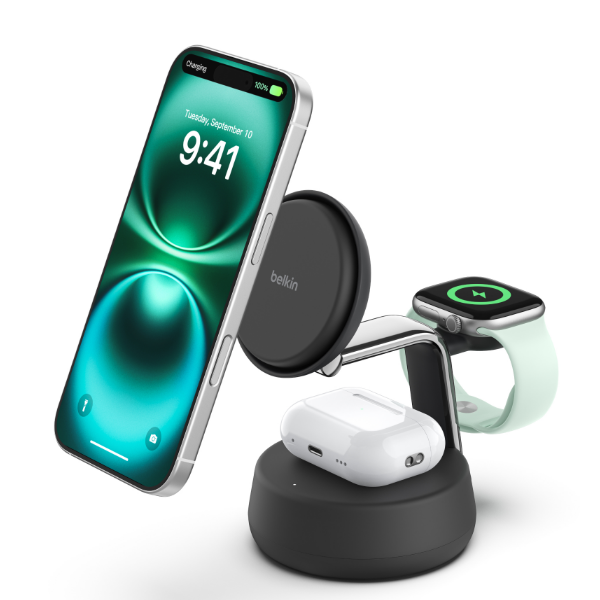 Belkin 3-in-1 wireless charging stand holding a smartphone, wireless earbuds case, and smartwatch, all charging simultaneously.