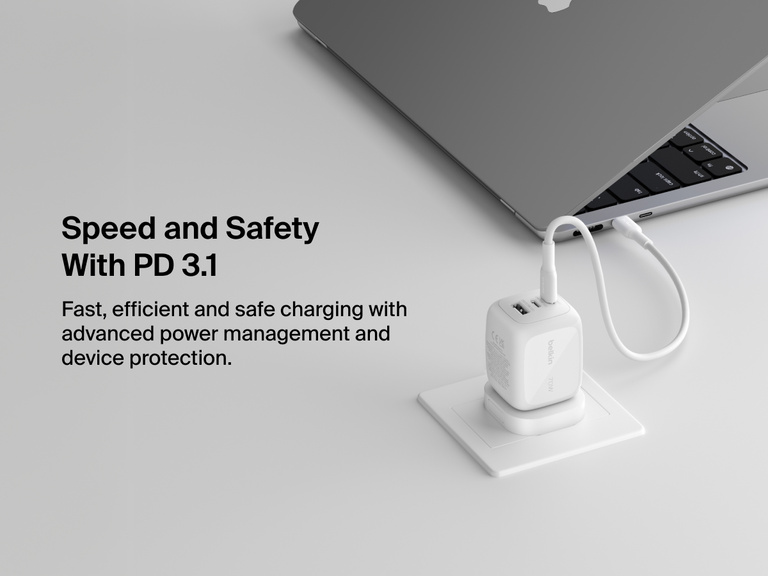 BoostCharge Pro 3-Port GaN Wall Charger 70W connected to a laptop, showcasing USB-C PD 3.1 technology for fast, efficient, and safe charging with advanced power management.