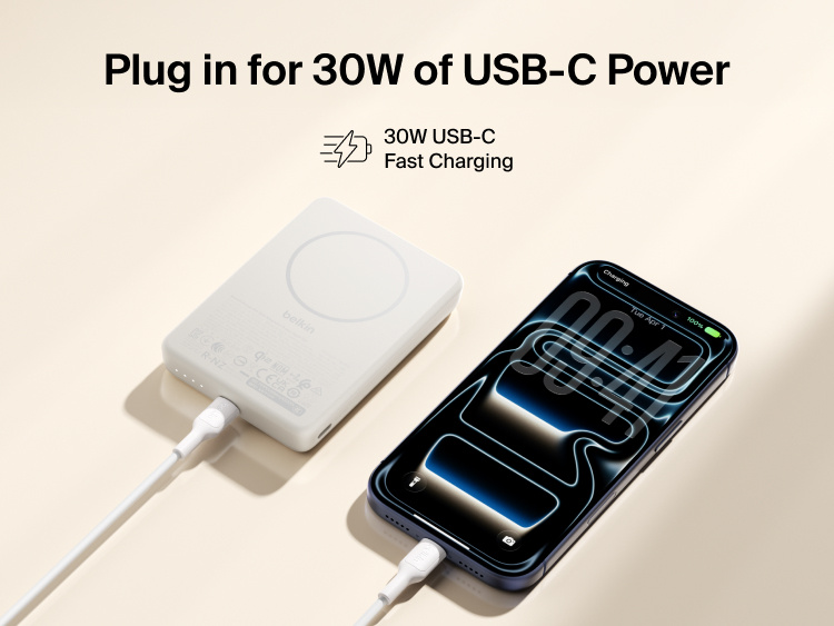Slim Magnetic Power Bank 10K with Qi2 connected by USB-C cable delivering fast wired charging to smartphone