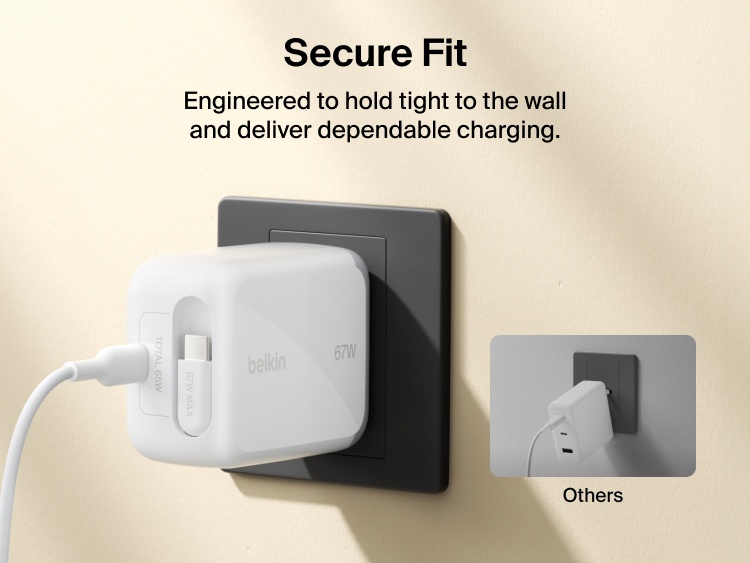 Belkin UltraCharge Retractable GaN Wall Charger 67W securely plugged into wall outlet with built-in retractable USB-C cable for stable, dependable fast charging.