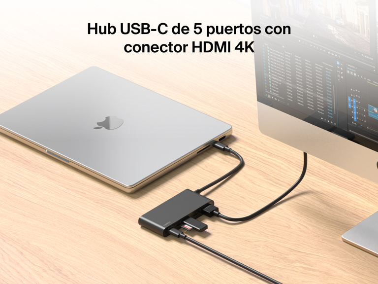 Belkin Connect 5-Port USB-C Hub with 4K HDMI links a MacBook to an external monitor and multiple devices on a wooden desk.