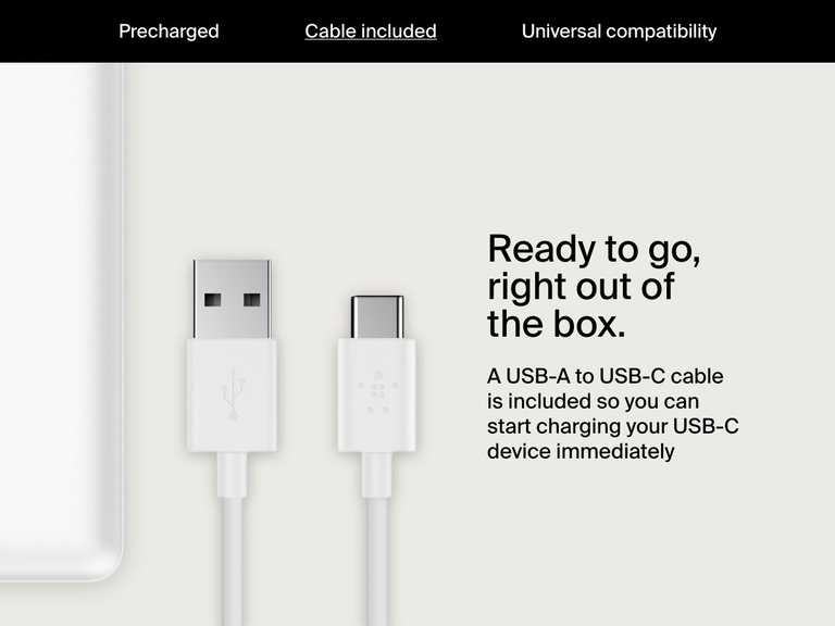 A USB-A to USB-C cable is shown next to a white Belkin BoostCharge Power Bank 10K, emphasizing that the included cable allows immediate charging of USB-C devices out of the box.