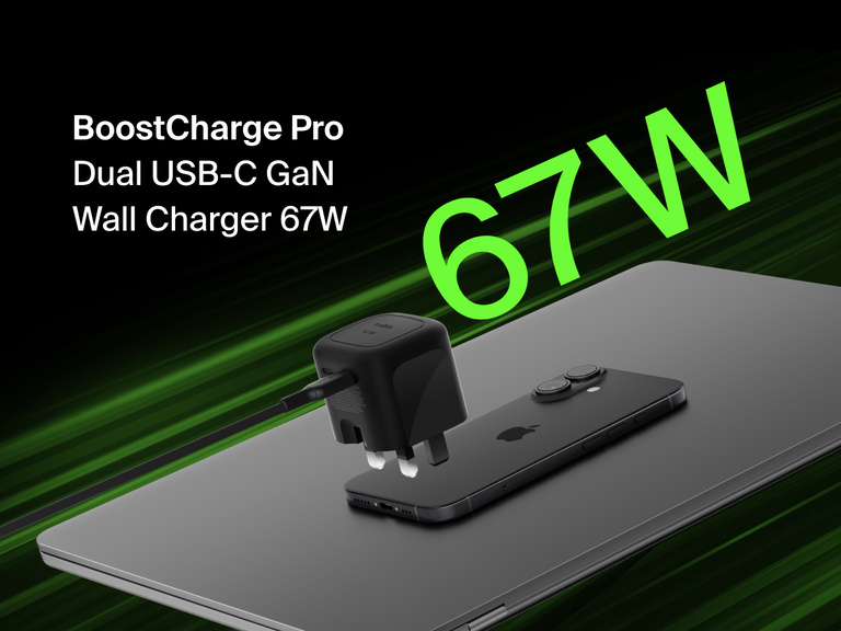 Belkin BoostCharge Pro Dual USB-C GaN Wall Charger 67W shown powering a device, highlighting fast, efficient charging performance.