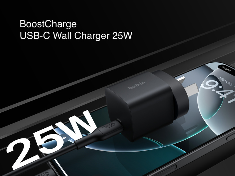 Belkin BoostCharge USB-C Wall Charger 25W shown plugged into a smartphone, highlighting its compact design and fast charging capability.