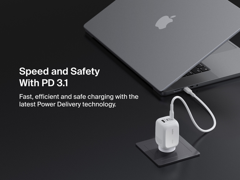 BoostCharge Pro 3-Port GaN Wall Charger 100W connected to a laptop, showcasing USB-C PD 3.1 technology for fast, efficient, and secure Power Delivery charging.
