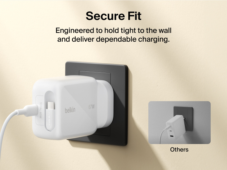 Belkin UltraCharge Retractable GaN Wall Charger 67W securely plugged into wall outlet with built-in retractable USB-C cable for stable, dependable fast charging.