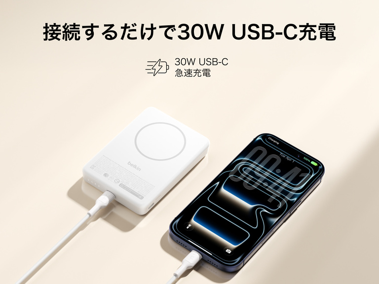Slim Magnetic Power Bank 10K with Qi2 connected via USB-C cable delivering fast charging to smartphone