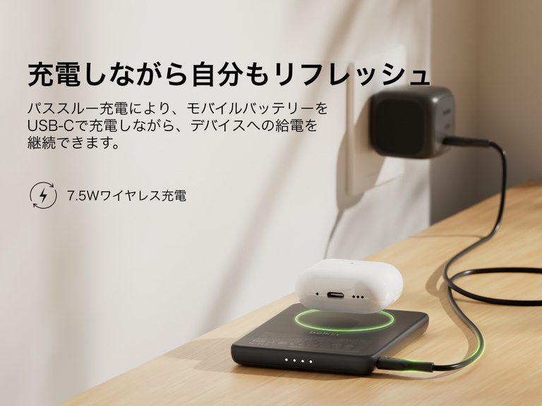 Belkin BoostCharge Slim Magnetic Power Bank 5K shown wirelessly charging earbuds while recharging via USB-C, demonstrating 7.5W pass-through charging functionality.