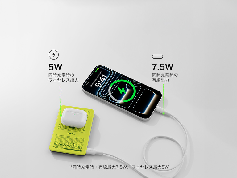 Belkin BoostCharge Slim Magnetic Power Bank 5K shown charging a smartphone via USB-C, highlighting 15W fast charging and dual wired or magnetic wireless power capability.