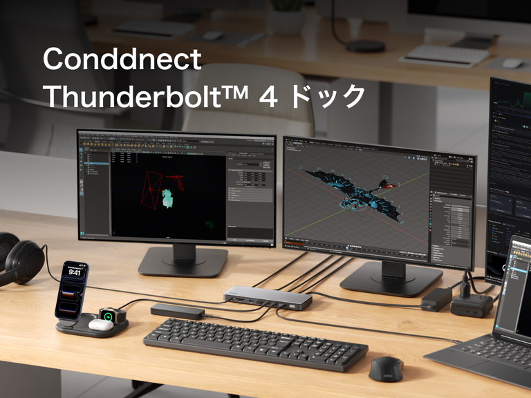 Thunderbolt 4ドックを使用してノートパソコンを机上の複数の外部モニターに接続し、クリエイティブおよび生産性向上のアプリケーションが表示されています。