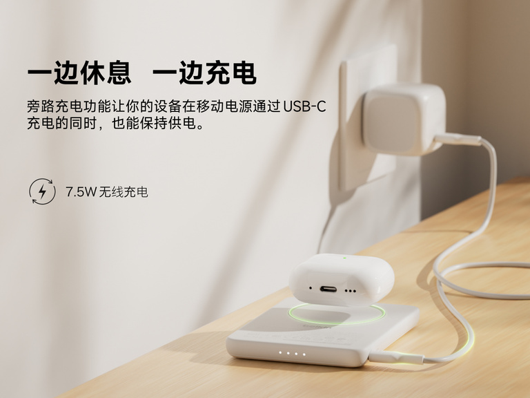 Belkin BoostCharge Slim Magnetic Power Bank 5K shown wirelessly charging earbuds while recharging via USB-C, demonstrating 7.5W pass-through charging functionality.