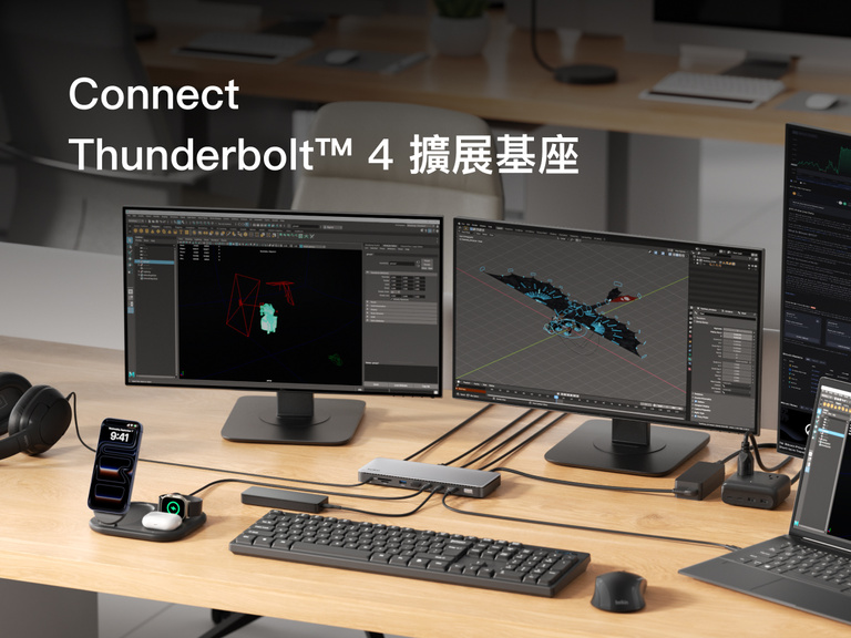 桌上有一個 Thunderbolt 4 擴展基座設置，將手提電腦連接至多部外部顯示器，並顯示創意與生產力應用程式畫面。
