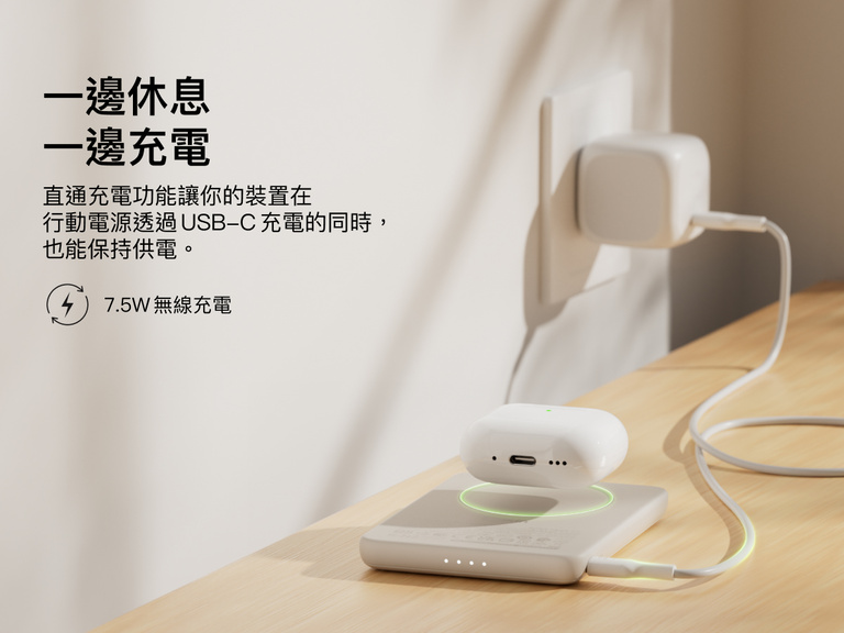 Belkin BoostCharge Slim Magnetic Power Bank 5K shown wirelessly charging earbuds while recharging via USB-C, demonstrating 7.5W pass-through charging functionality.