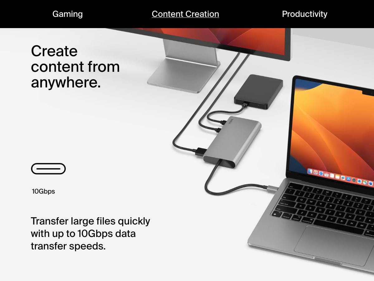 A laptop connected to the Belkin Connect Universal USB-C 8-in-1 Dual Display Core Hub transfers data to an external drive and dual monitors, demonstrating up to 10Gbps data transfer speeds for content creation.
