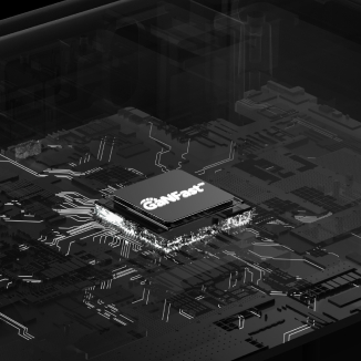 The image shows a close-up of a dark-colored electronic circuit board featuring a central processor labeled "GaNFast." The board is detailed with intricate circuitry lines and components, highlighted by subtle lighting effects, creating a high-tech, futuristic look.