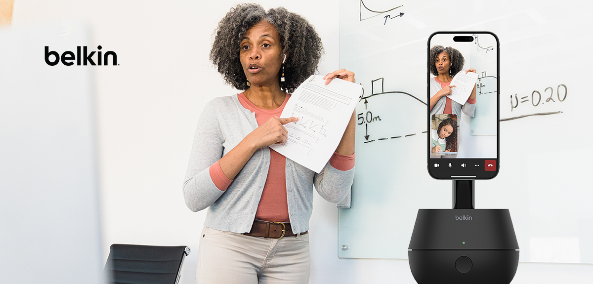 A woman teaching a class and have the Belkin Auto Tracking Stand Pro with Dockkit captures her.