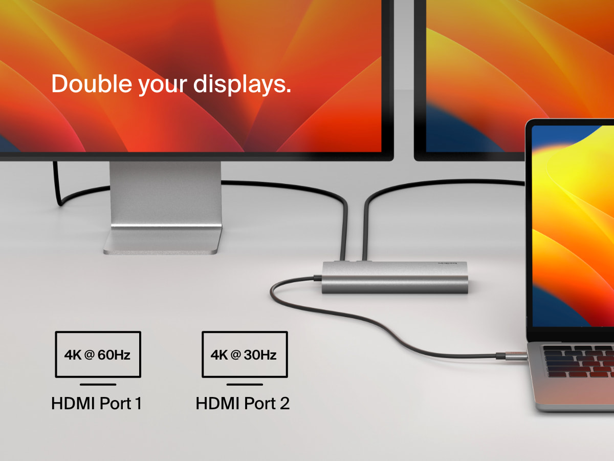 The Belkin Connect Universal USB-C 8-in-1 Dual Display Core Hub is shown connected to a laptop and two external monitors, supporting dual 4K displays via HDMI—one at 60Hz and one at 30Hz.
