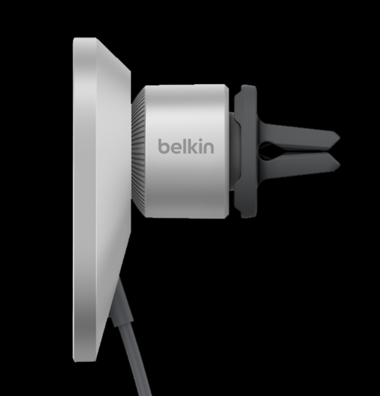 The image shows a side view of the BoostCharge Pro Magnetic Wireless Car Charger with Qi2 15W, showcasing the Belkin logo on the charger and a vent clip attachment for secure in-car mounting.