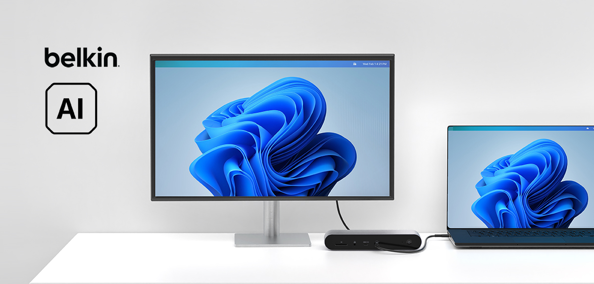 Belkin AI-enhanced setup featuring a desktop monitor, a docking station, and a laptop connected for a seamless multi-display experience, showcasing advanced technology integration.
