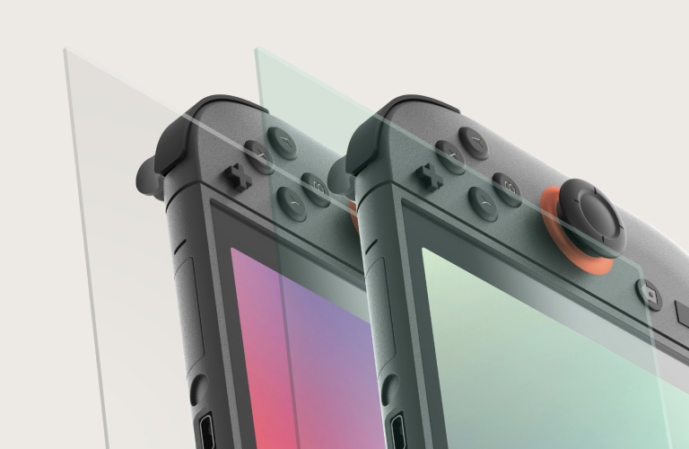 Two Nintendo Switch 2 consoles are shown in close-up, each aligned with a transparent screen protector being applied. The image highlights the clarity, edge-to-edge coverage, and precise fit of the protectors against a clean, light background—emphasizing screen protection as a key accessory feature.