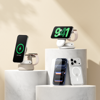 Belkin charging stands displayed on marble pedestals with iPhones charging wirelessly, shown in various orientations against a beige background.