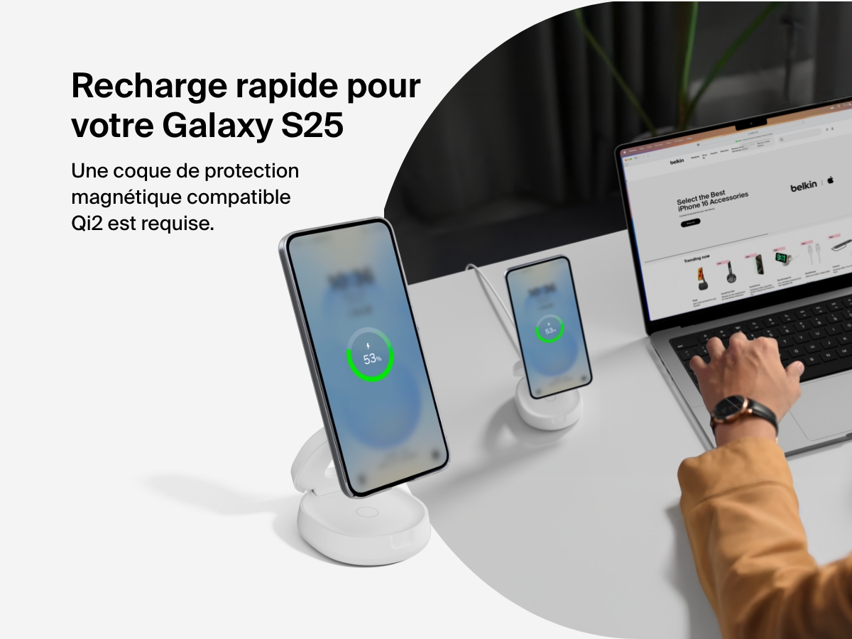 Belkin BoostCharge 2-in-1 Convertible Magnetic Charging Stand with Qi2 15W shown fast charging a Galaxy S25 in a Qi2-compatible magnetic case at a desktop workspace.